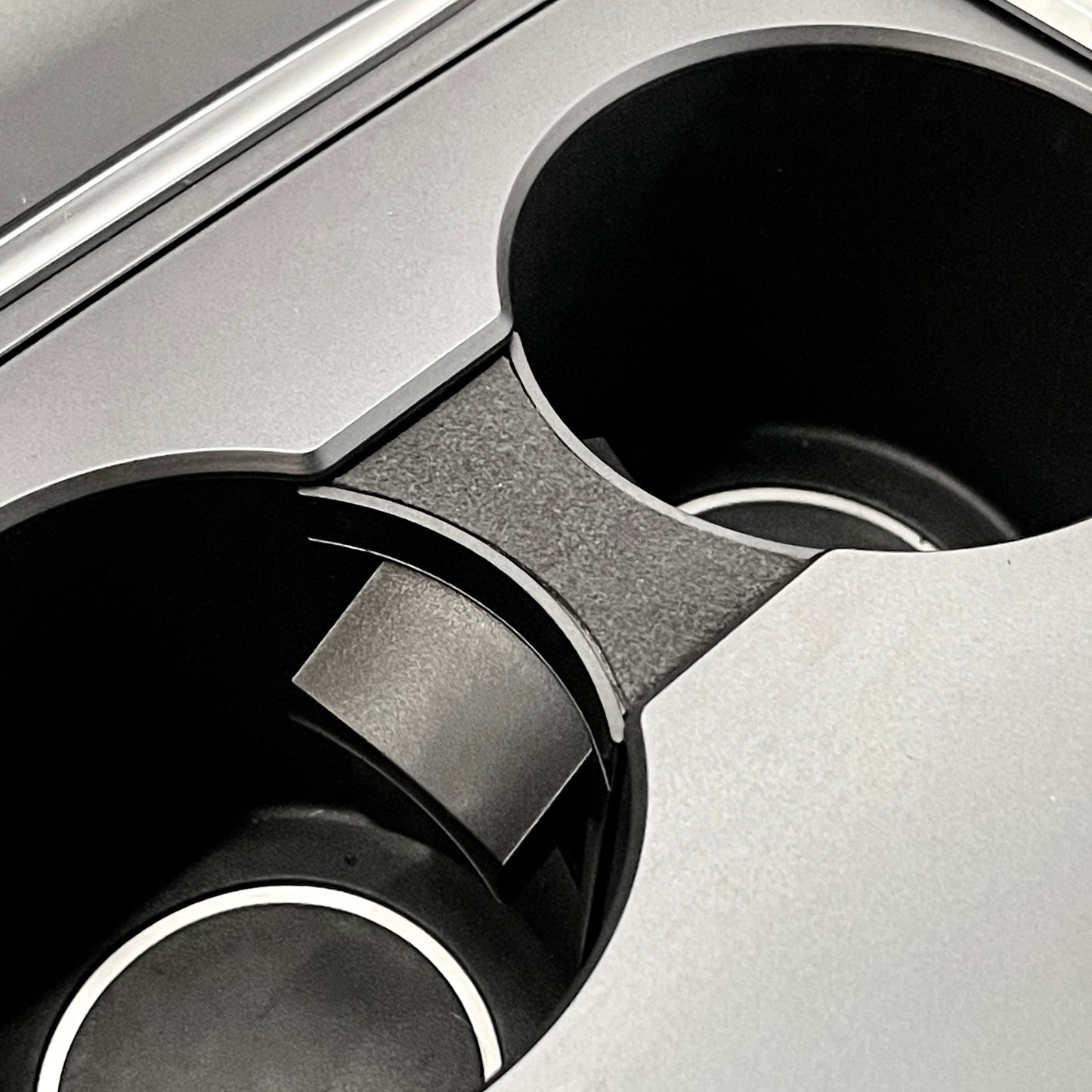 Kupinpidikkeen jakotukki jousella Tesla Model 3 & Y 2021+