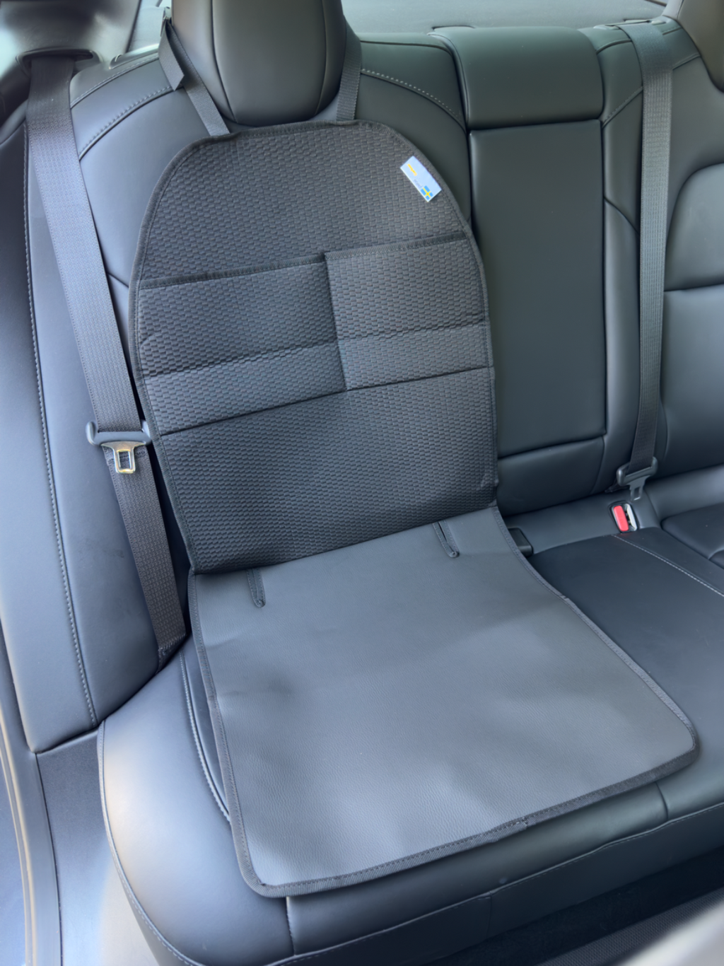 Spark/sitsskydd med förvaringsfickor