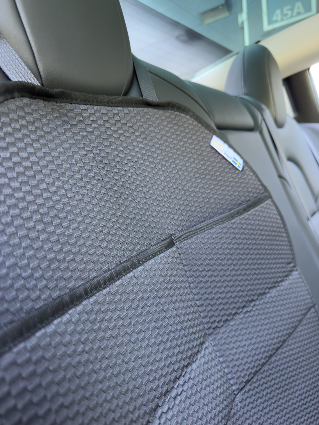 Spark/sitsskydd med förvaringsfickor