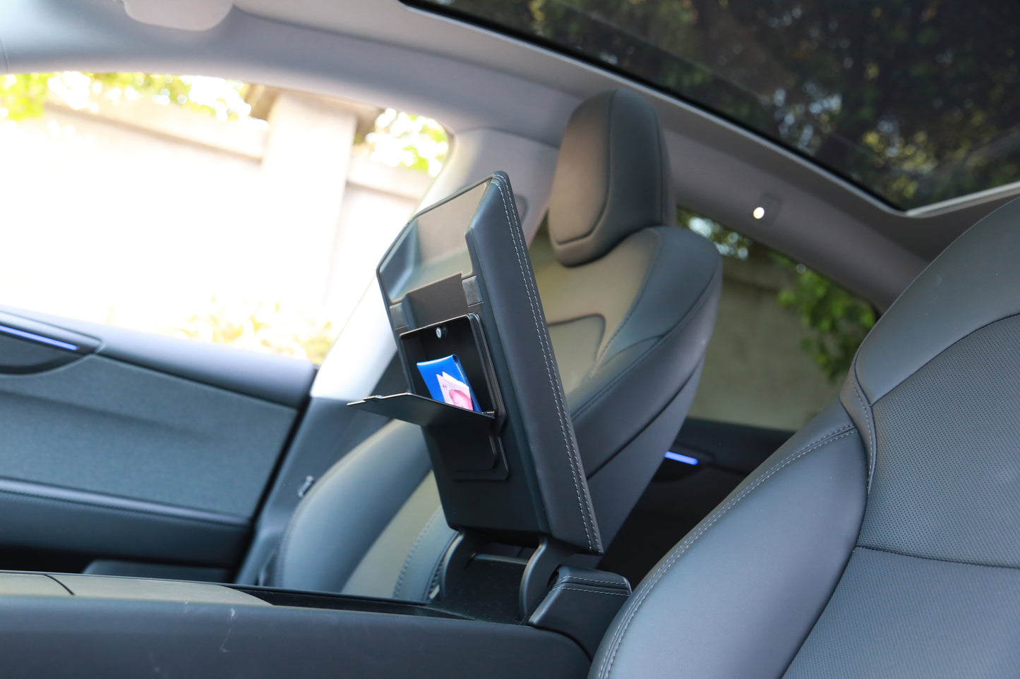 Hidden storage box in the armrest Tesla Model Y Juniper