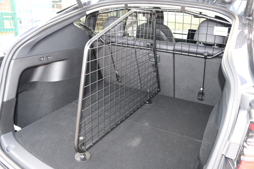 Tesla Model Y lastskyddsfördelare till lastgaller