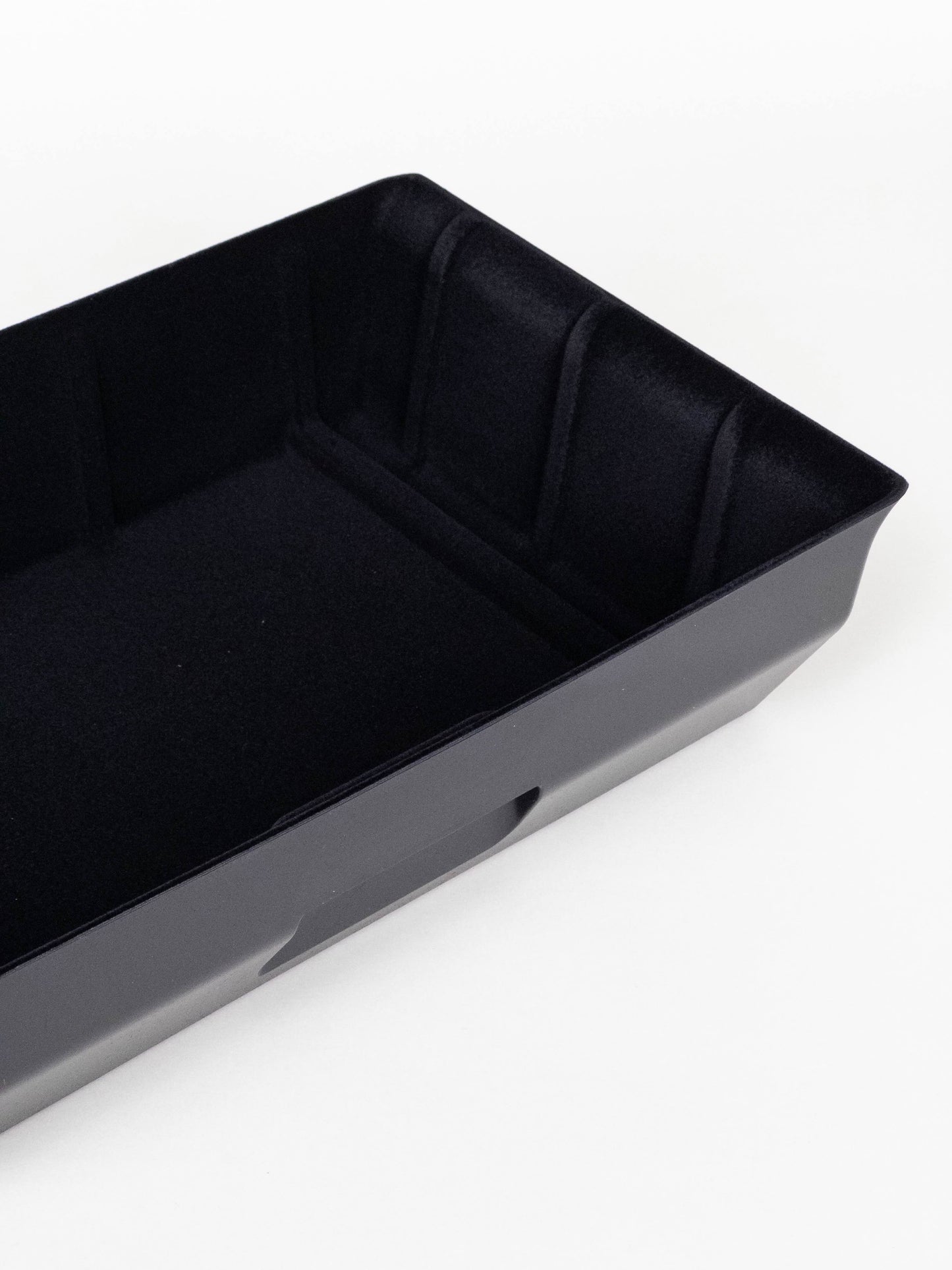 Model Y front seat storage box