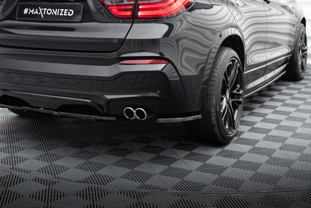 BMW X4 M--pakkauksen takaosan jakajat
